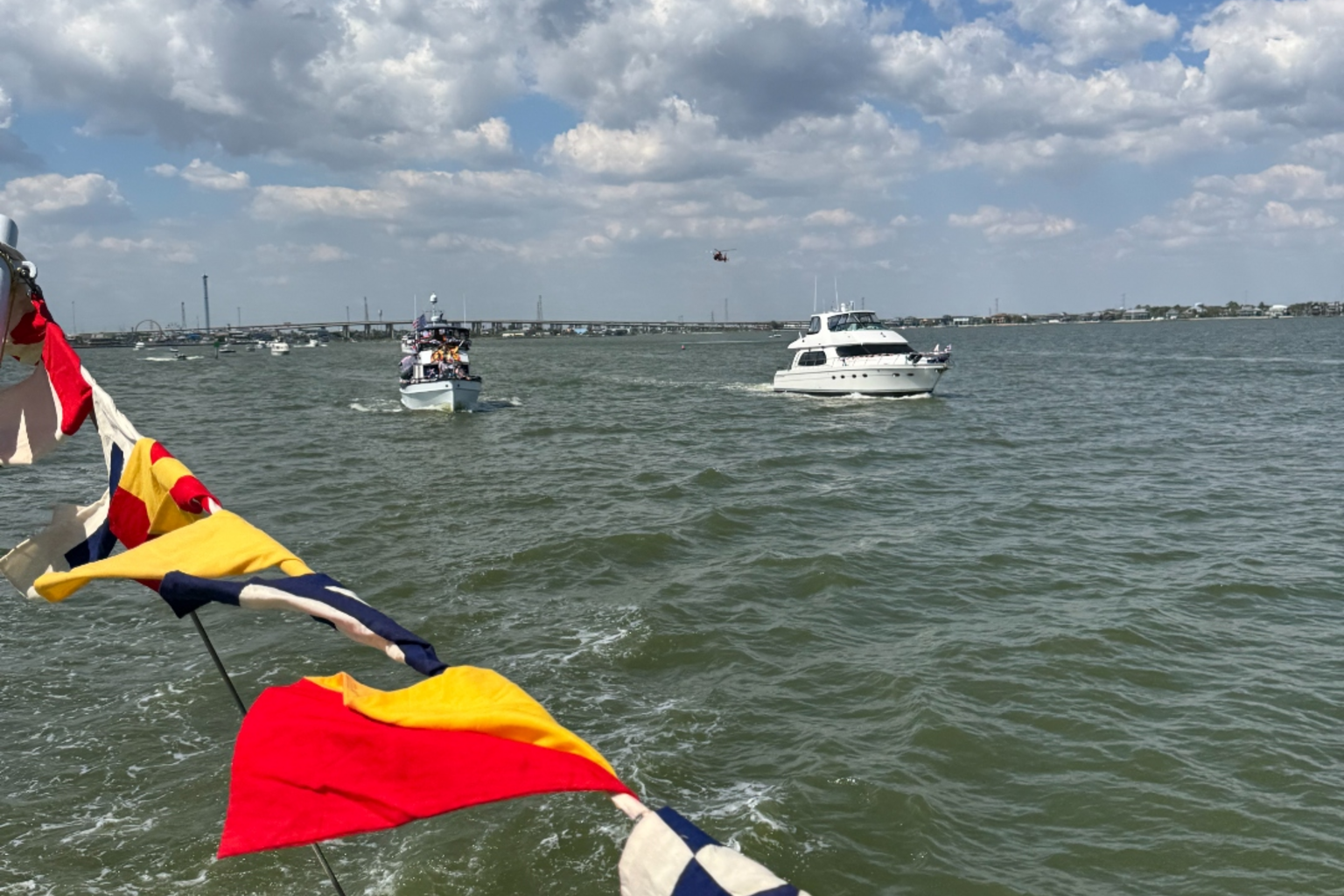 Burgee flags flying from a boat on Galveston Bay.